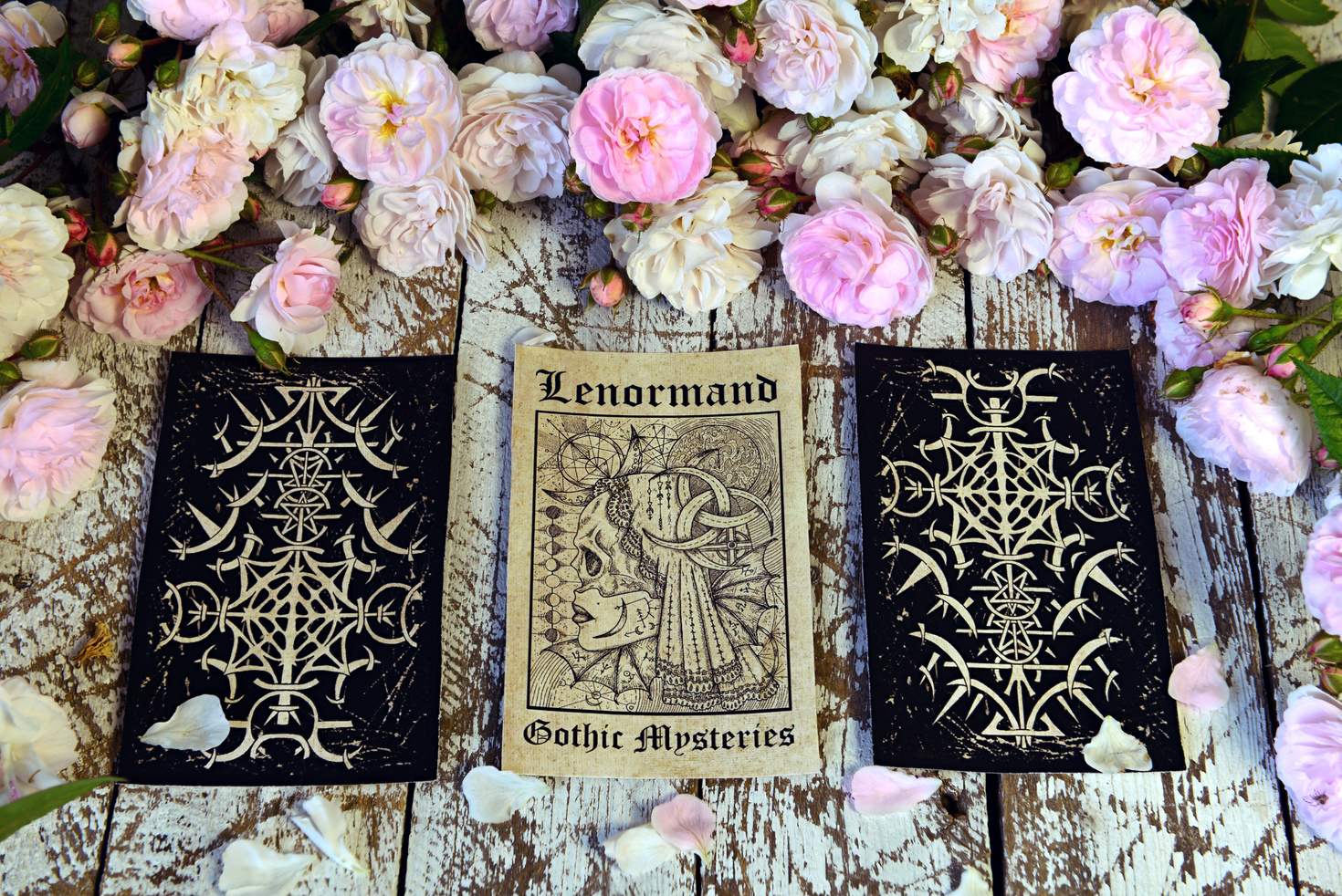 Still life with Lenormand cards layout on witch table.